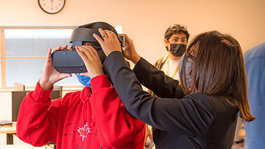 students with a vr headset