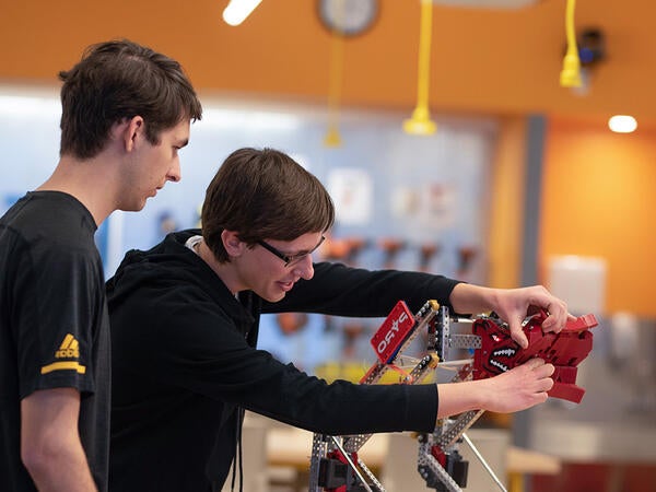 Students working with 3D Printer